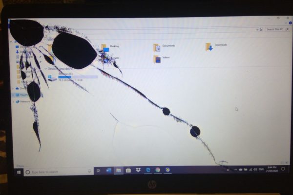broken laptop screen being repaired