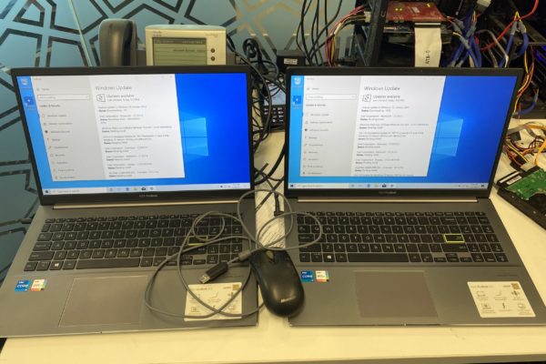 two laptops being updated for windows 10